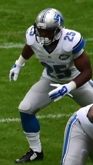Theo Riddick in uniform on the field during an NFL game